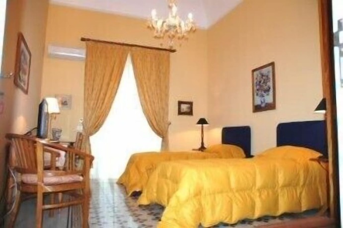 Imagen de la habitación del Hotel Palazzo Pantaleo. Foto 5