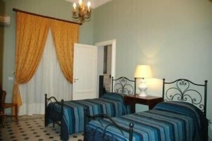 Imagen de la habitación del Hotel Palazzo Pantaleo. Foto 9