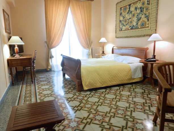 Imagen de la habitación del Hotel Palazzo Pantaleo. Foto 16