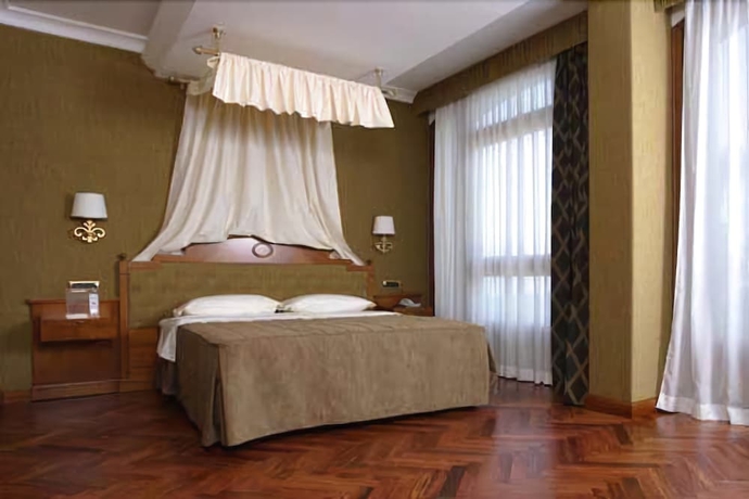 Imagen de la habitación del Hotel Palazzo Rosenthal Vesuview. Foto 2