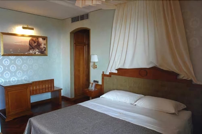 Imagen de la habitación del Hotel Palazzo Rosenthal Vesuview. Foto 3