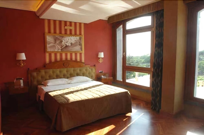 Imagen de la habitación del Hotel Palazzo Rosenthal Vesuview. Foto 9