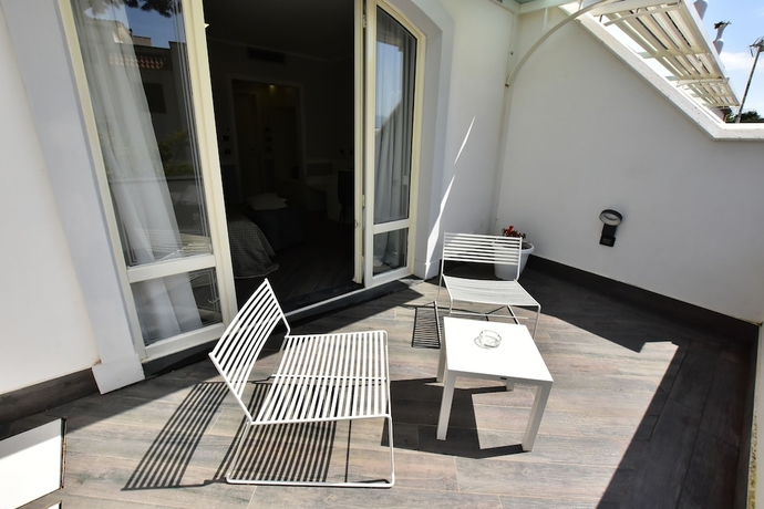 Imagen de la habitación del Hotel Palazzo Rosenthal Vesuview. Foto 12