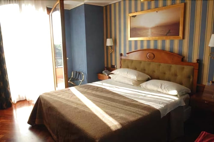 Imagen de la habitación del Hotel Palazzo Rosenthal Vesuview. Foto 14