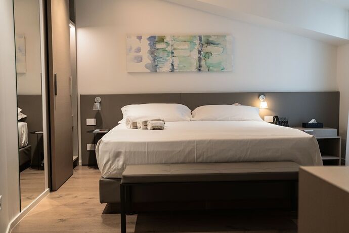 Imagen de la habitación del Hotel Palazzo Sangiorgio. Foto 17