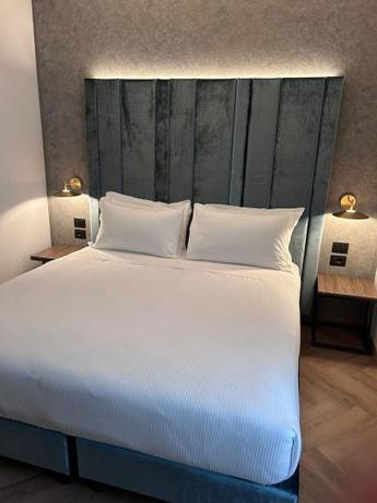 Imagen de la habitación del Hotel Palazzo Santo Spirito. Foto 8