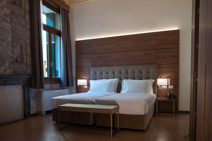 Imagen de la habitación del Hotel Palazzo Scamozzi. Foto 11