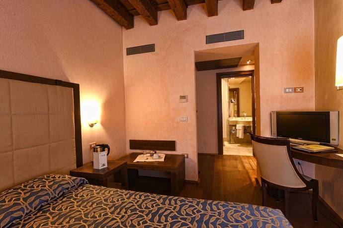 Imagen de la habitación del Hotel Palazzo Selvadego. Foto 8