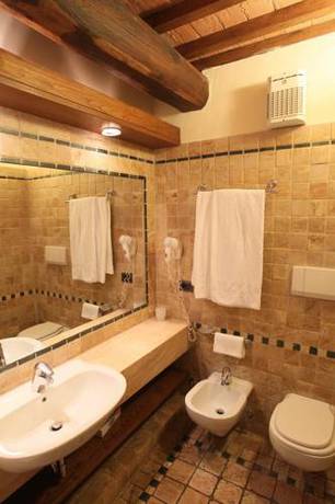 Imagen de la habitación del Hotel Palazzo Squarcialupi. Foto 2