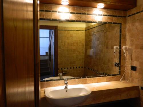 Imagen de la habitación del Hotel Palazzo Squarcialupi. Foto 13