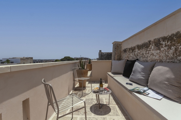 Imagen de la habitación del Hotel Palazzo Tafuri Boutique. Foto 19