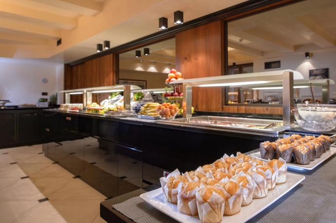 Imagen del bar/restaurante del Hotel Palazzo Veneziano. Foto 2