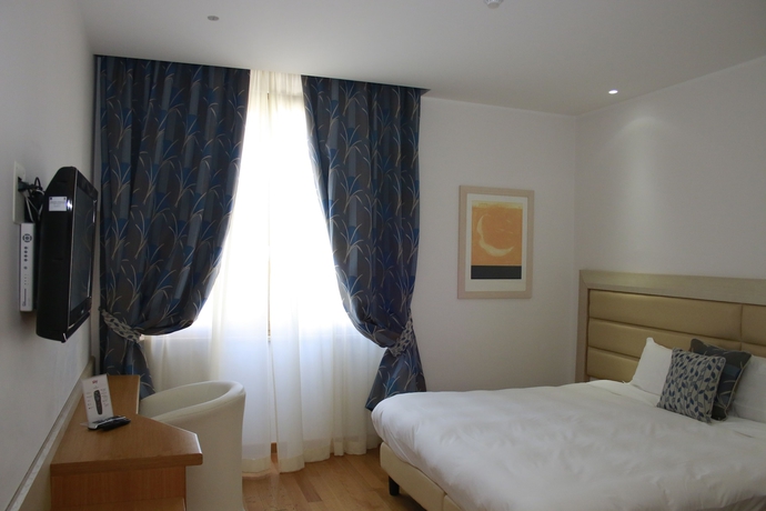 Imagen de la habitación del Hotel Palazzo Virgilio. Foto 14