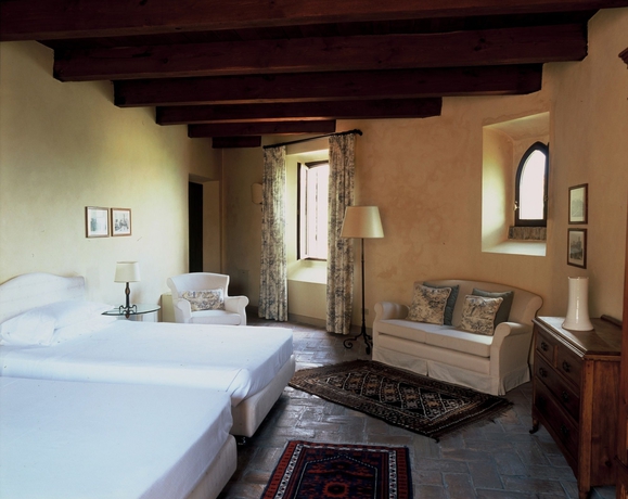 Imagen de la habitación del Hotel Palazzo Viviani Castello Di Montegridolfo. Foto 8