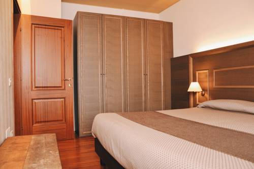 Imagen de la habitación del Hotel Palazzo della Scala Spa Hotel Suites and Apartments. Foto 14