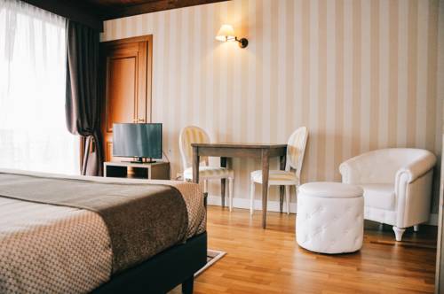 Imagen de la habitación del Hotel Palazzo della Scala Spa Hotel Suites and Apartments. Foto 16