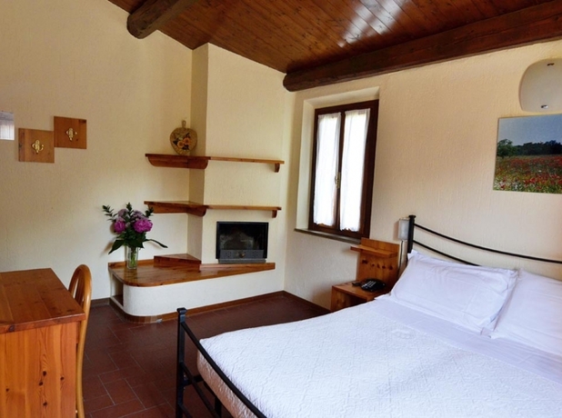 Imagen de la habitación del Hotel Palazzuolo, San Quirico D'orcia. Foto 7