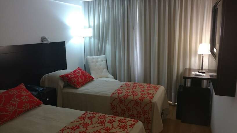 Imagen de la habitación del Hotel Palermo Bridge. Foto 14