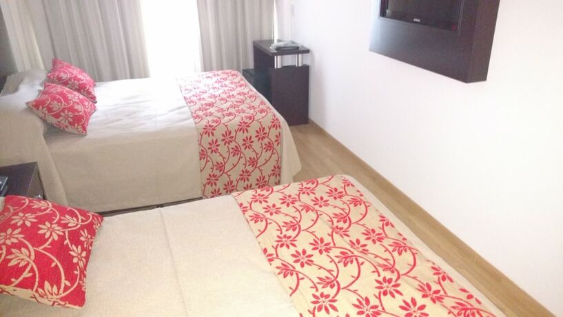 Imagen de la habitación del Hotel Palermo Bridge. Foto 18