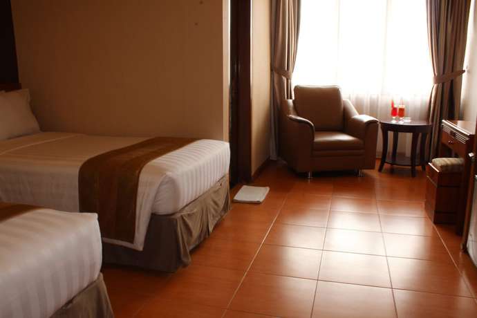Imagen de la habitación del Hotel Palette Citra Inn. Foto 10