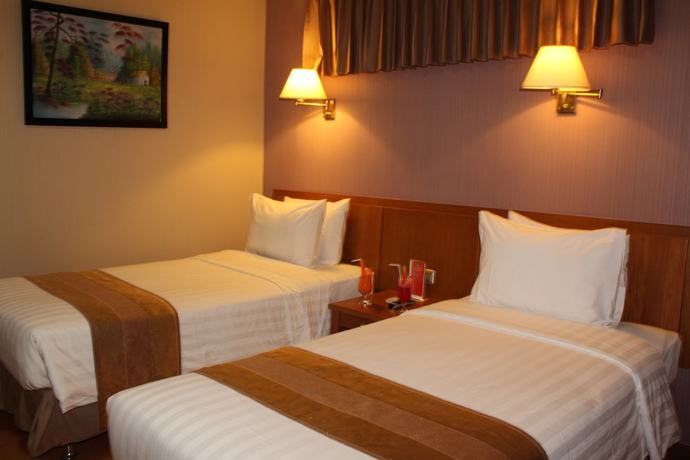 Imagen de la habitación del Hotel Palette Citra Inn. Foto 13