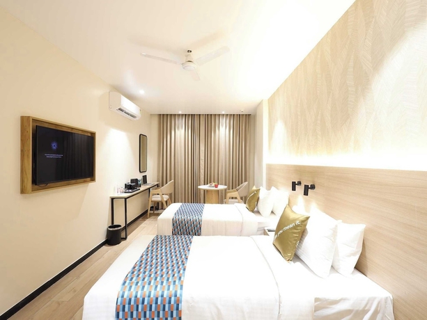Imagen de la habitación del Hotel Palette Millennium City Gurugram. Foto 10