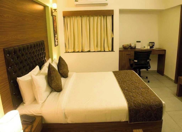 Imagen de la habitación del Hotel Palette The Royal Castle Resort Rajkot. Foto 5