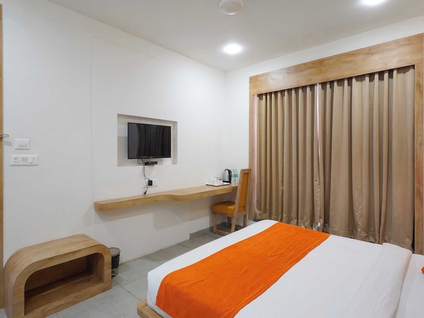 Imagen de la habitación del Hotel Palette The Royal Castle Resort Rajkot. Foto 11