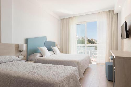 Imagen de la habitación del Hotel Palia Las Palomas. Foto 8