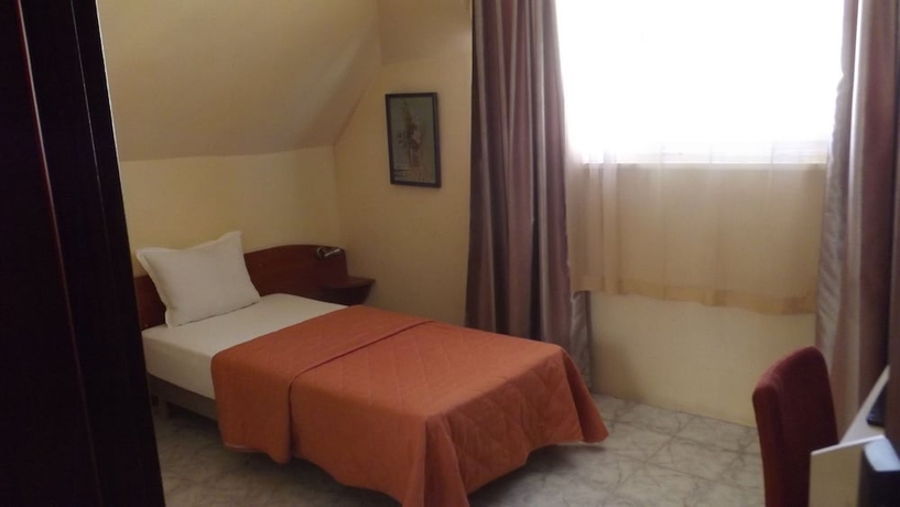 Imagen de la habitación del Hotel Palitra Family. Foto 15