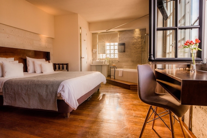 Imagen de la habitación del Hotel Palla Boutique. Foto 9