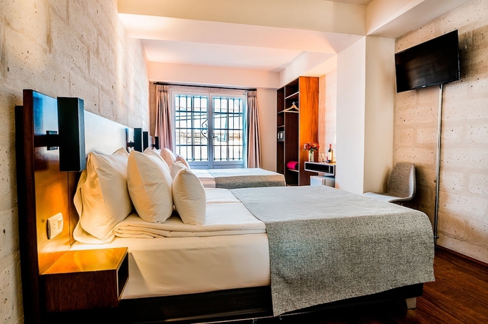 Imagen de la habitación del Hotel Palla Boutique. Foto 17