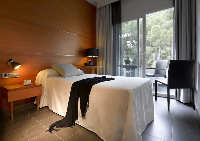 Imagen de la habitación del Hotel Palladium Hotel Cala Llonga. Foto 7