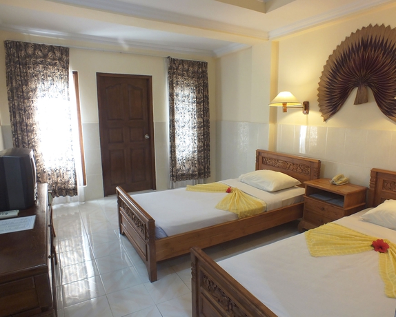 Imagen de la habitación del Hotel Palm Beach Bali. Foto 5