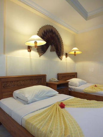 Imagen de la habitación del Hotel Palm Beach Bali. Foto 7
