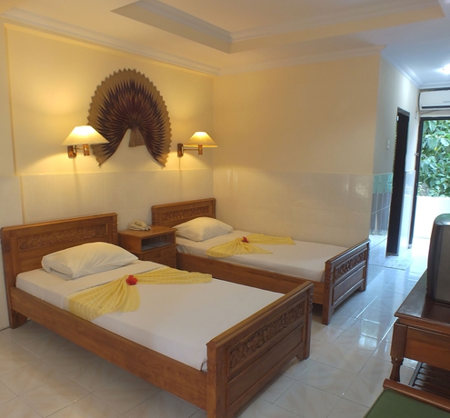 Imagen de la habitación del Hotel Palm Beach Bali. Foto 8