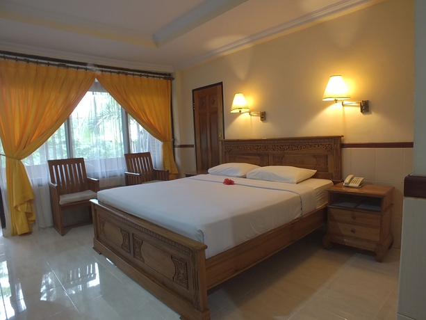 Imagen de la habitación del Hotel Palm Beach Bali. Foto 14