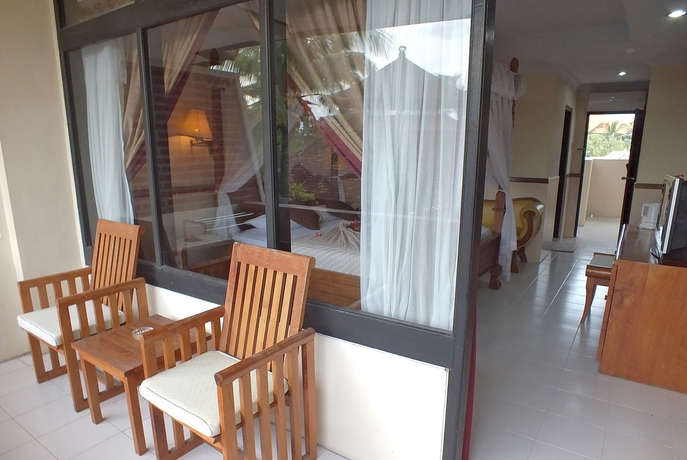 Imagen de la habitación del Hotel Palm Beach Bali. Foto 15