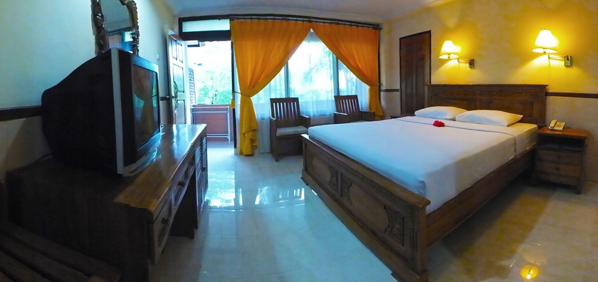 Imagen de la habitación del Hotel Palm Beach Bali. Foto 16