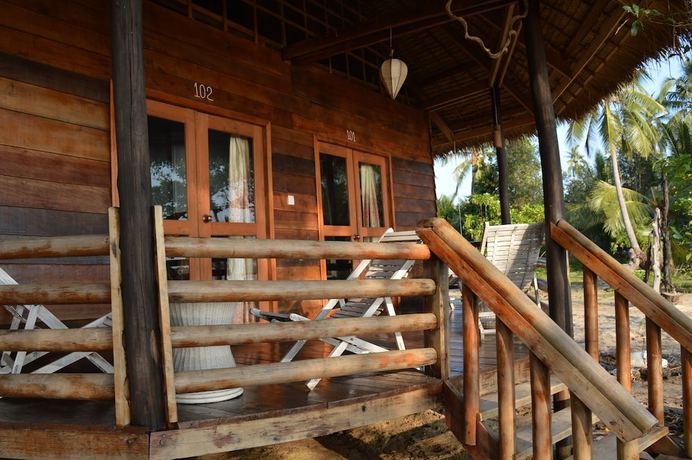 Imagen de la habitación del Hotel Palm Beach Bungalow Resort. Foto 5