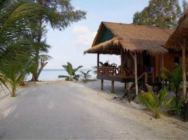 Imagen de la habitación del Hotel Palm Beach Bungalow Resort. Foto 6