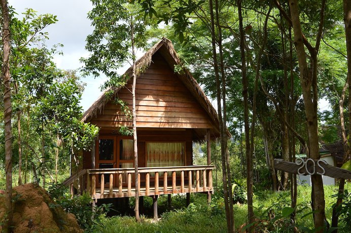 Imagen de la habitación del Hotel Palm Beach Bungalow Resort. Foto 7