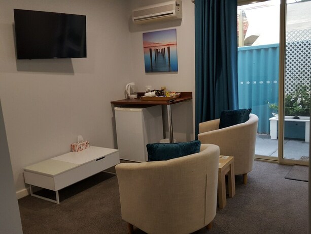 Imagen de la habitación del Hotel Palm Beach Guest House. Foto 14