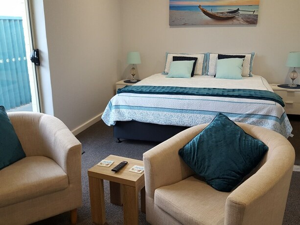 Imagen de la habitación del Hotel Palm Beach Guest House. Foto 15