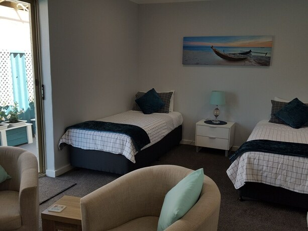 Imagen de la habitación del Hotel Palm Beach Guest House. Foto 21