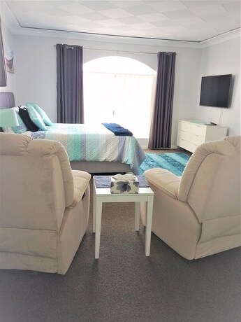 Imagen de la habitación del Hotel Palm Beach Guest House. Foto 26