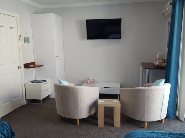 Imagen de la habitación del Hotel Palm Beach Guest House. Foto 32