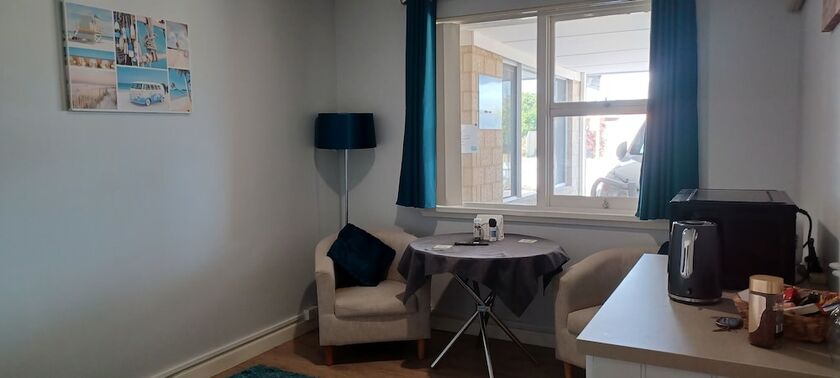 Imagen de la habitación del Hotel Palm Beach Guest House. Foto 34