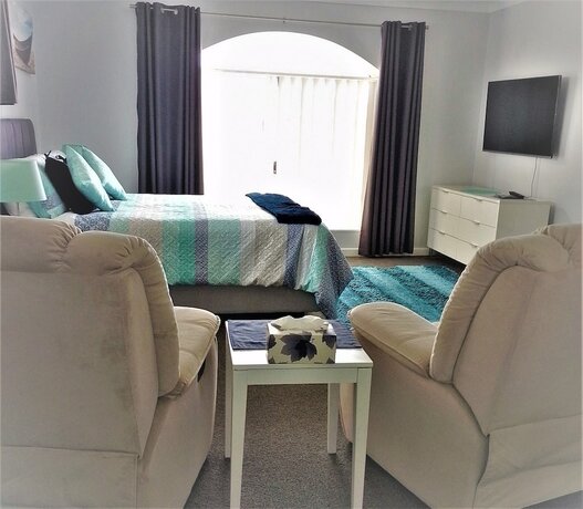 Imagen de la habitación del Hotel Palm Beach Guest House. Foto 38