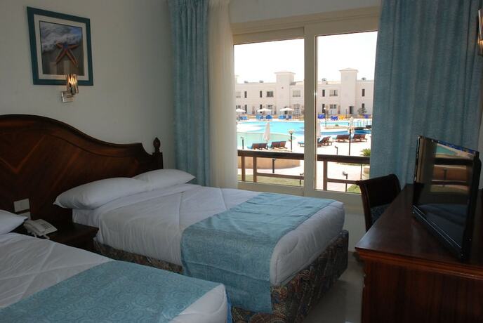 Imagen de la habitación del Hotel Palm Beach Hostmark Resort. Foto 19